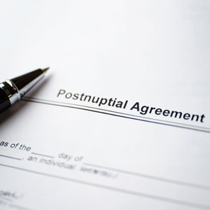 Pen on a document labeled "Postnuptial Agreement." - Law Office of Jordana N. Better